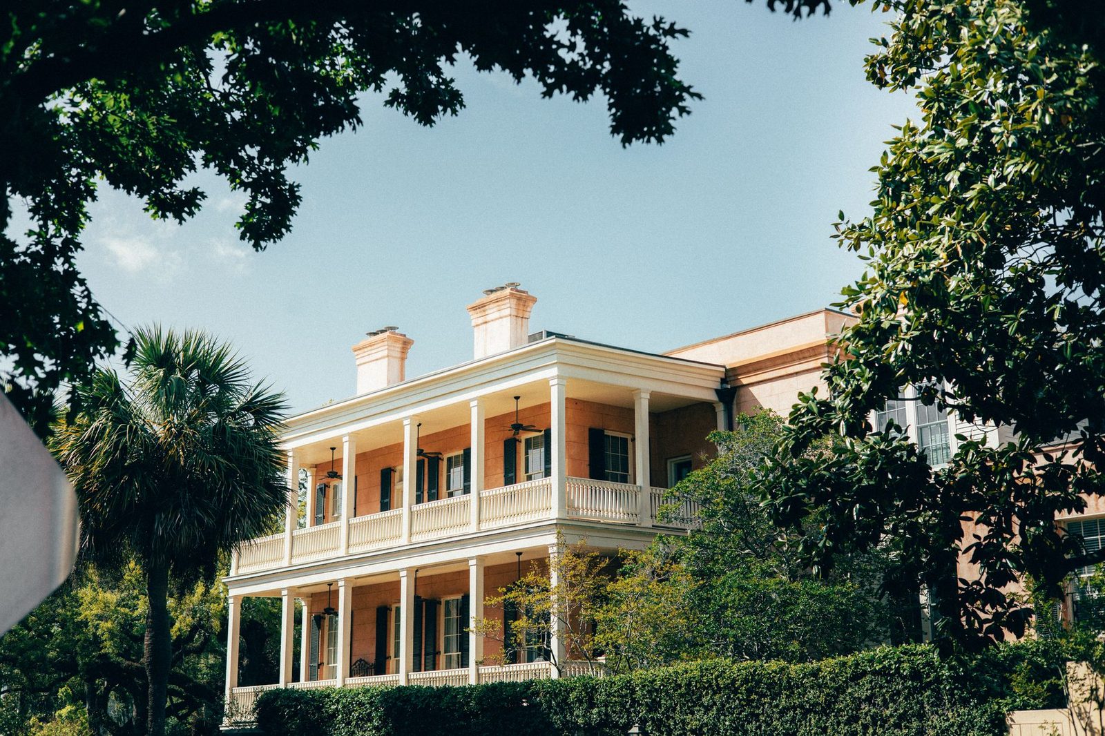 Historic Southern mansion surrounded by greenery in Savannah, Georgia
